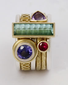 'Stacking Ring multi-stone' in 18K gold with green Tourmaline, mauve Sapphire, Ruby and Amethyst